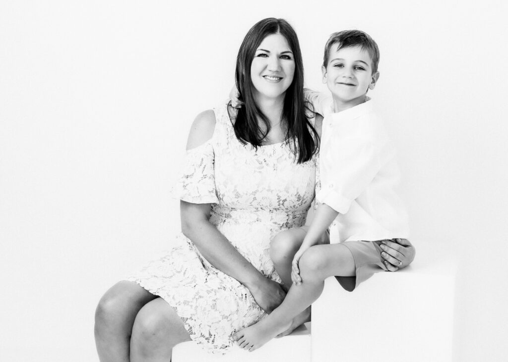 Black and White studio portrait of a Mom with son in Katy, TX